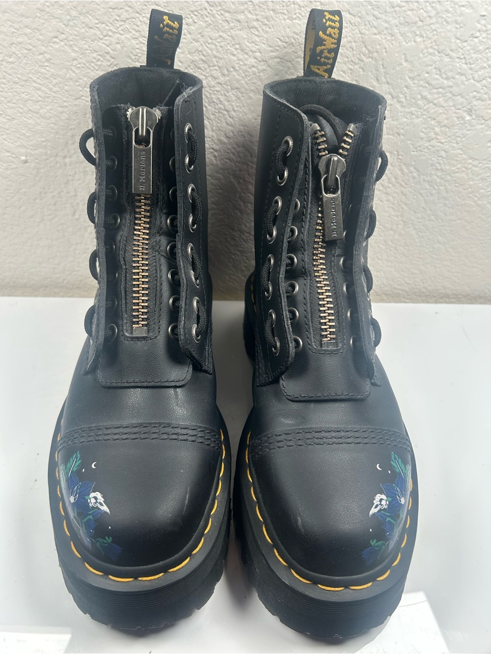 Dr. Martens Black Leather Platform Lace-Up Boots with Floral Accent